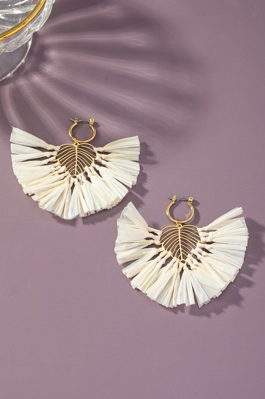 Statement earrings with raffia straw leaf drop